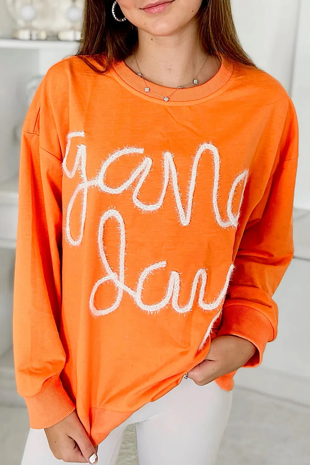 Carrot Contrast Game Day Casual Top with Embroidered Detail